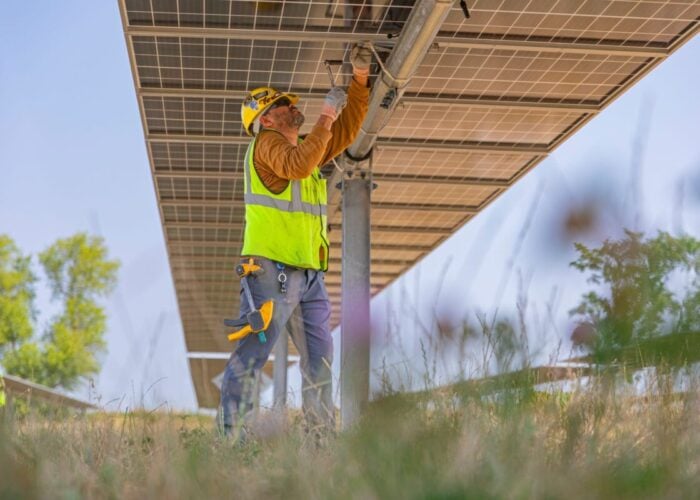 Worker on an utility-scale solar project